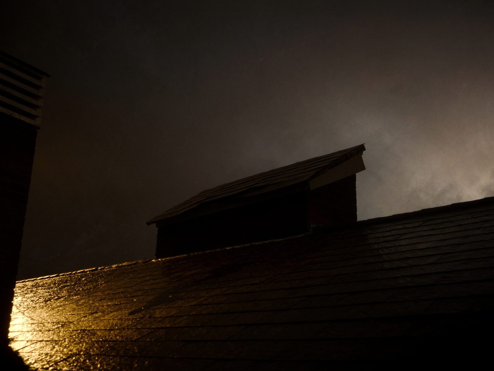 Roof repair work after storm damage